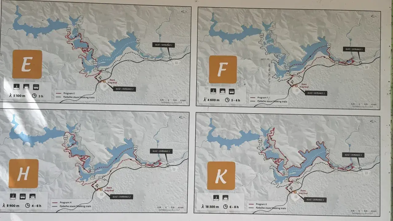 Plany czterech tras pieszych: E, F, H, K. Każda mapa pokazuje szlak wokół jeziora, dystans i czas trwania wycieczki jednodniowej.